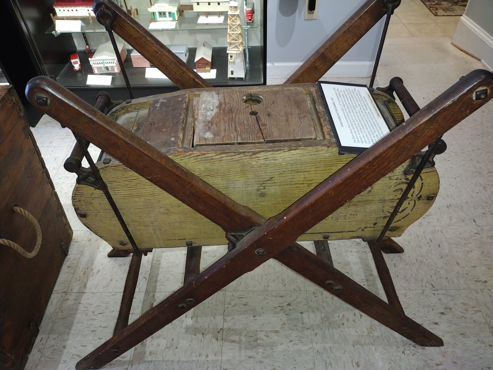 Antique wooden folding chair on display