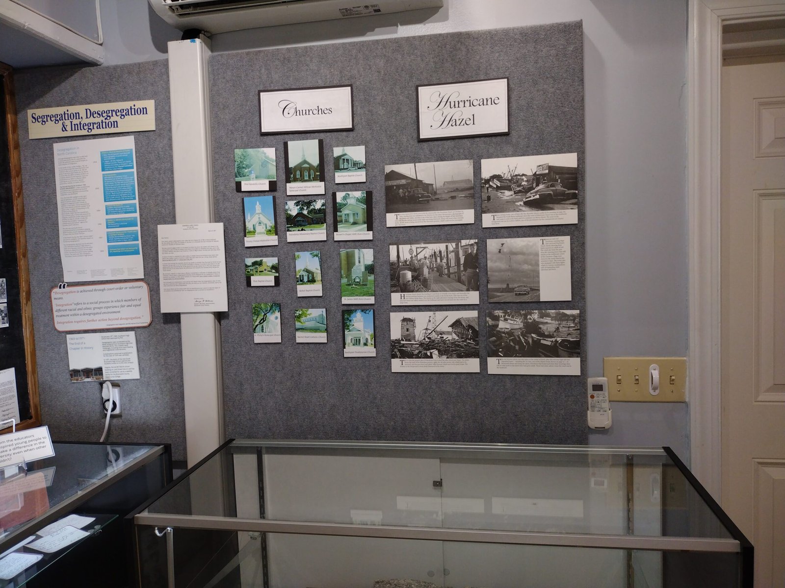 Wall of historic photographs and documents