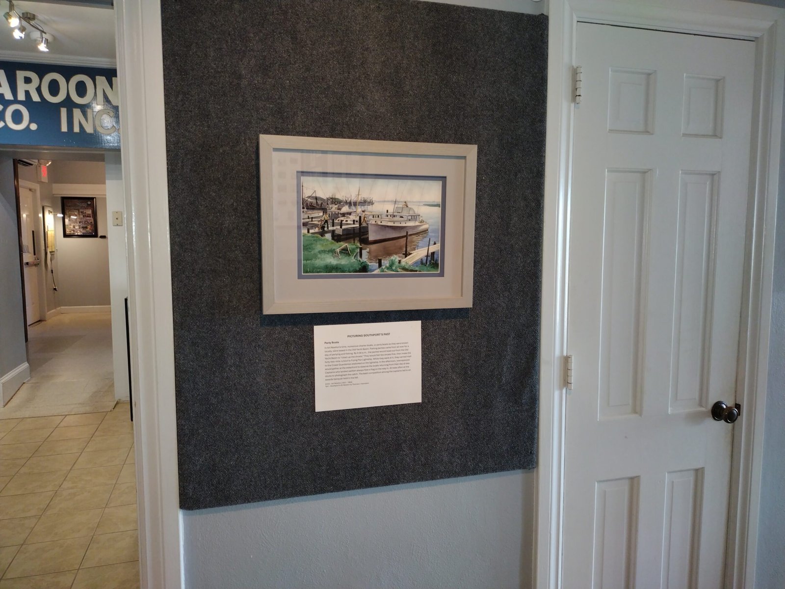 Hallway with framed artwork
