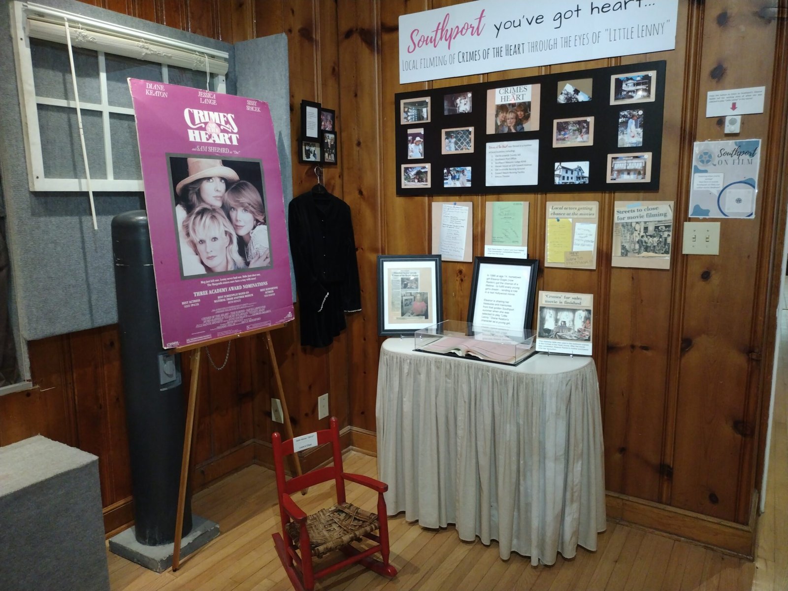 Exhibit room with pink circus poster