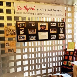 Community quilt and photo collage display