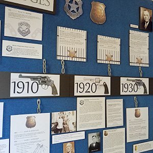 Exhibit wall on Southport police chiefs through the decades